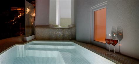 Grand suite with private heated river pool and jetted tub.